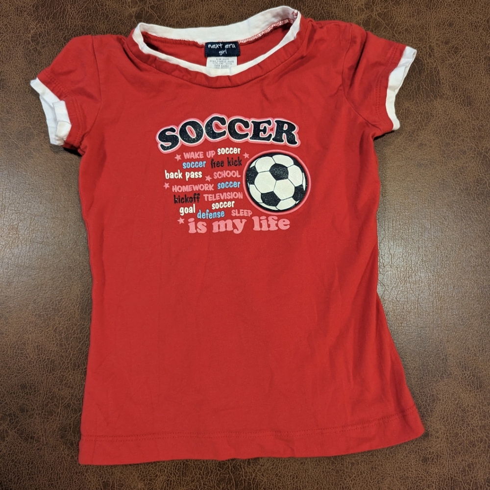 Girls short sleeve shirt . Size large .